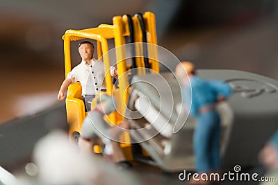 Miniature Artisans Doing Maintenance Stock Photo