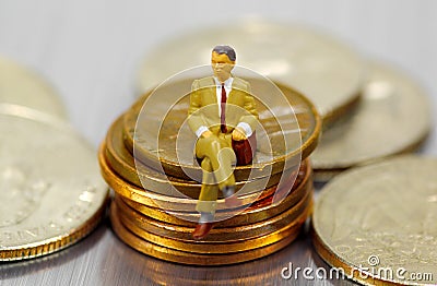 Miniature Businessman Stock Photo