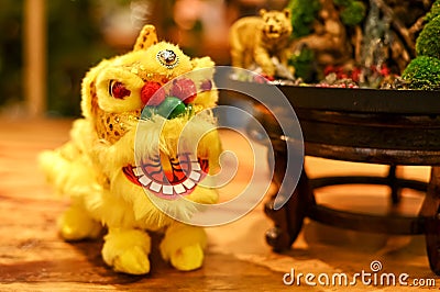 Miniature Chinese Lion Dancer Decoration and Toy Stock Photo