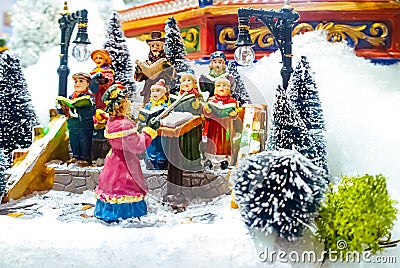 Miniature Christmas village scene. Christmas decorations toys. Stock Photo