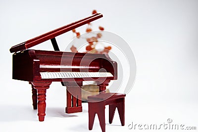Miniature classic piano keyboard instrument isolated on white background Stock Photo
