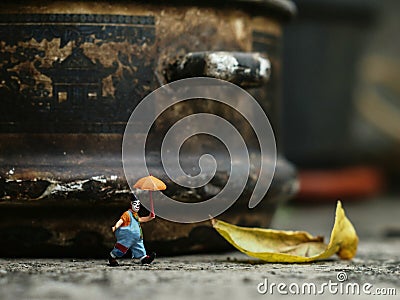 Miniature of clown walking alone Stock Photo