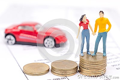 Miniature couple people and stack coins on statement and the car Stock Photo