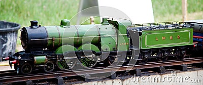 a miniature engineering live steam model railway steam locomotive Stock Photo