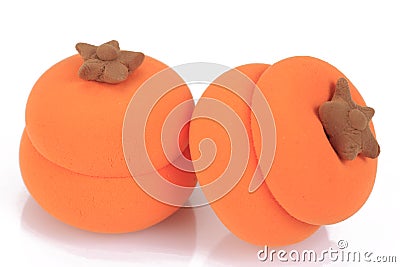 Miniature fake Persimmon Stock Photo