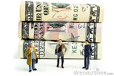 Business meeting, standing in front of american dollar banknotes and making economic decisions Stock Photo