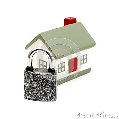 Miniature house with lock Stock Photo