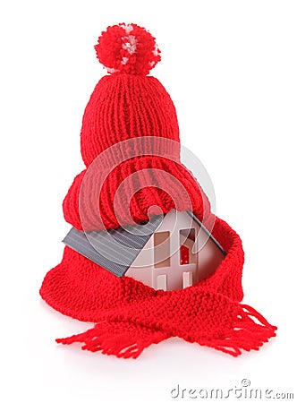 Miniature House with Red Wool Scarf Hat Stock Photo
