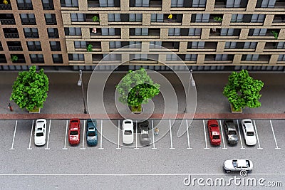 Miniature model, miniature toy buildings, cars and people. City maquette. Stock Photo