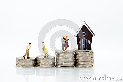 Miniature people : Business on financial transactions for home loan. Image use for invesment, business concept Stock Photo