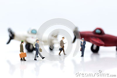 Miniature people : businesses team waiting for airplane travel around the world, business trip travel advisory agency or online Stock Photo