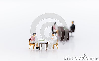 Miniature people : Businessman meeting with employee for job interviews, job vacancies. Image use for reducing unemployment rate Stock Photo