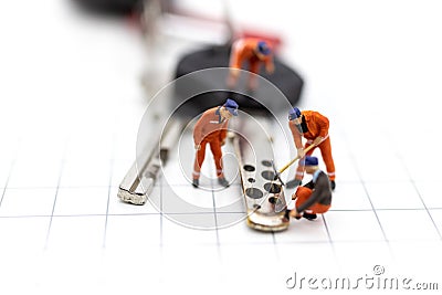 Miniature people : Car repair workers for return to use. Image use for maintenance, warranty, business concept Stock Photo