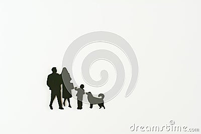 Miniature people flat in black, father, mother,son and dog on white background with copy space. In concept family Stock Photo