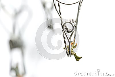 Miniature people : Joyful swinging on a swing,Fun and happiness Stock Photo