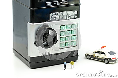 Miniature people : Police with criminal thief opens the safe stealing money from bank Stock Photo