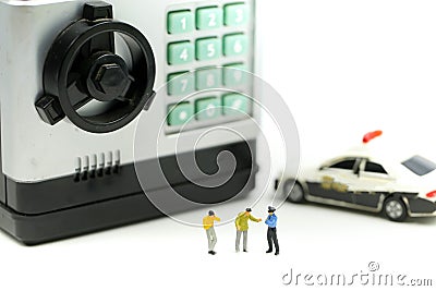 Miniature people : Police with criminal thief opens the safe stealing money from bank Stock Photo