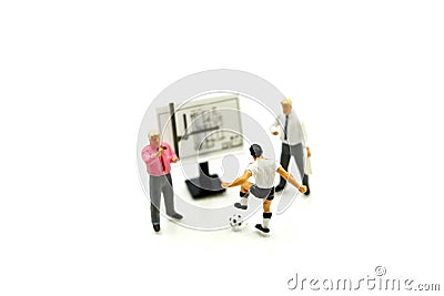 Miniature people : Soccer Football Coaches are Planning with the Stock Photo