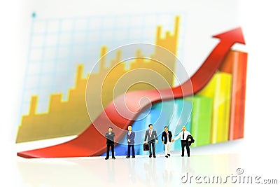 Miniature people : Successful businessman with Paper graph chart ,Business Growth concept Stock Photo