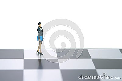 Miniature people toy figure photography. A businesswoman walking above chessboard. Isolated on white background Stock Photo