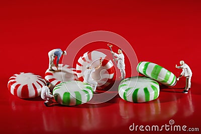 Miniature People Who Paint Colors on Our Candy Stock Photo