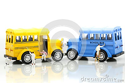 Miniature people: Workers brush painting school bus,Back to school concept. Stock Photo