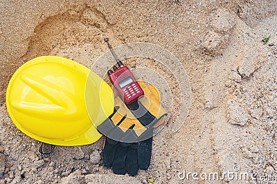 Miniature replica wooden house is located on a sand pile. Stock Photo