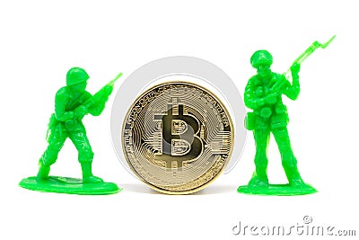 Miniature Soldier and bitcoin on white background Stock Photo