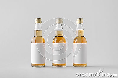 Miniature Spirits / Liquor Bottle Mock-Up - Three Bottles. Blank Label Stock Photo