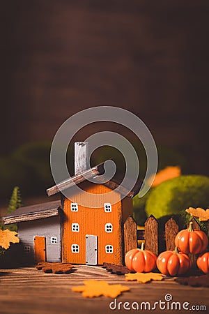 Miniature Thanksgiving little autumn cottages village in the forest Stock Photo