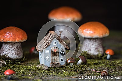 Miniature Thanksgiving little autumn cottages village in the forest Stock Photo