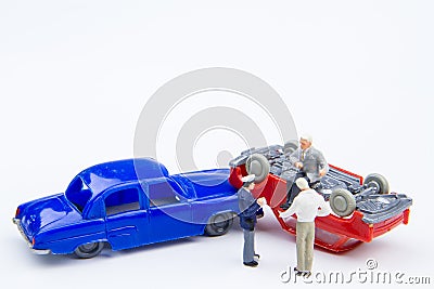 Miniature tiny toys car crash accident damaged.Insurance on the Stock Photo