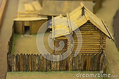 miniature toy house in the garden. Wooden houses in the village handmade housework Editorial Stock Photo