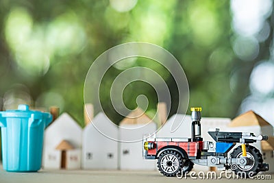 Miniature tricycle for loading and unloading garbage. Vendor served garbage collection in home to sale Stock Photo