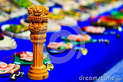 Miniature wooden replica of Ashoka Stambha. An ancient historic indian monument.Lion face Pliiar of Ashoka, Indian national emblem Stock Photo