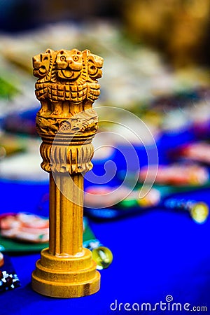 Miniature wooden replica of Ashoka Stambha. An ancient historic indian monument.Lion face Pliiar of Ashoka, Indian national emblem Stock Photo