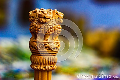 Miniature wooden replica of Ashoka Stambha. An ancient historic indian monument.Lion face Pliiar of Ashoka, Indian national emblem Stock Photo