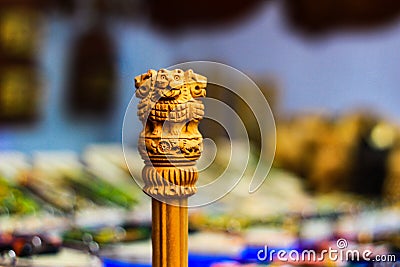 Miniature wooden replica of Ashoka Stambha. An ancient historic indian monument.Lion face Pliiar of Ashoka, Indian national emblem Stock Photo