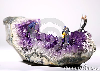 Miniature Workers in the Mining of Minerals Field Stock Photo