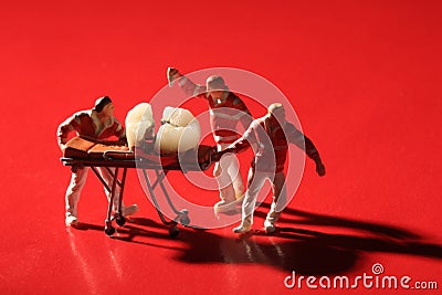 Miniature Workers Performing Dental Procedures. Dental Office Ar Stock Photo