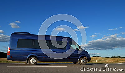 Minibus on highway Stock Photo