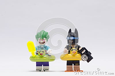 Lego vacation joker and batman minifigures isolated on white background Editorial Stock Photo