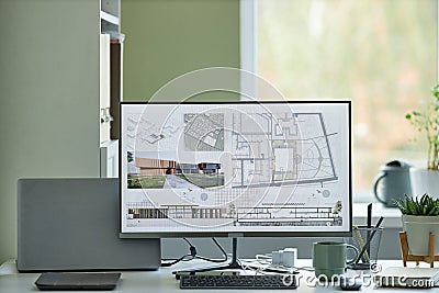 Computer with 3D blueprints on screen Stock Photo