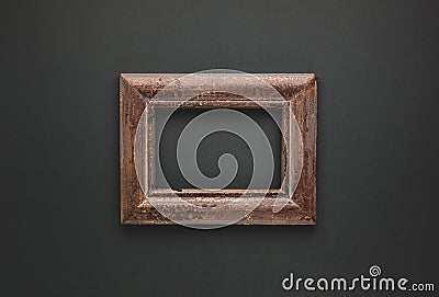 Minimal composition with vintage frame on dark background. Flat lay, copy space Stock Photo