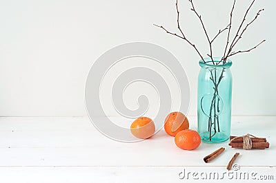 Minimal elegant composition with tangerines and vase Stock Photo
