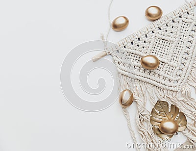 Minimal Flat lay Gold Easter eggs on white background. Stock Photo