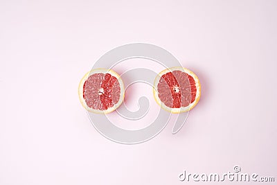 Minimal fruit background. Top view of sliced citrus fruits grape Stock Photo