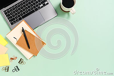 Minimal work space - Creative flat lay photo of workspace desk. Top view office desk with laptop, coffee cup and notebook on Stock Photo