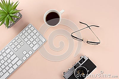 Minimal workspace with technology equipment on pastel pink background Stock Photo