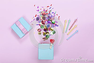 Minimalism. Gift box, colored elements, confetti, mock-up, Happy Birthday. copy space. party background. Stock Photo